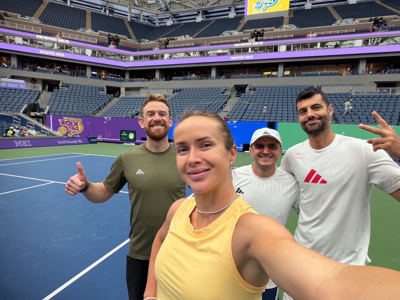 Oleksandr Foka with Elina Svitolina and her team on Arthur Ashe Stadium at the 2026 US Open